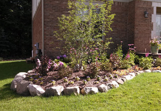 About Our Company | Squeals Landscaping, Inc. - about-us-lawn-stones